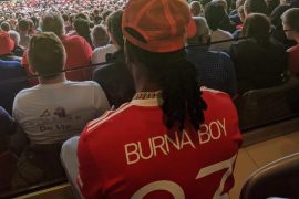 Burn Boy Gets Customized New Man United Jersey At Old Trafford (VIDEO)