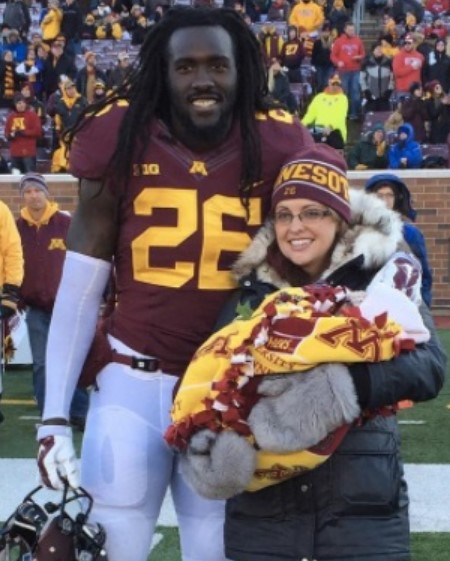 De'Vondre Campbell and Nicole Hartzer