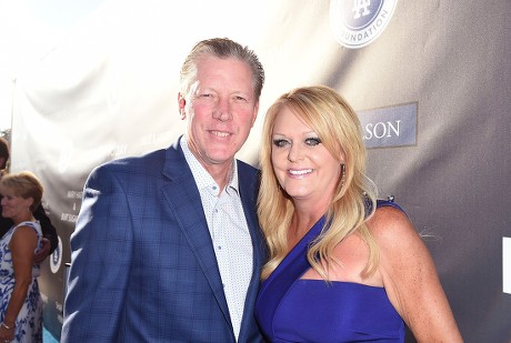 Orel Hershiser and his wife Dana Deaver pose together at the 10th