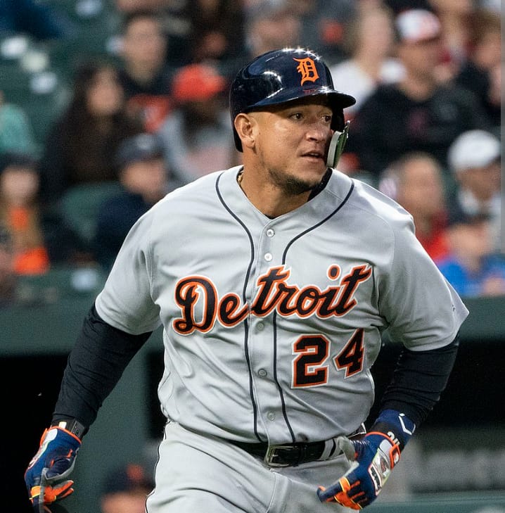 Detroit Tigers' Miguel Cabrera, far left, sits with his wife, Rosangel  Cabrera, second from left, and