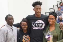 Jalen Smith with his parents and sister