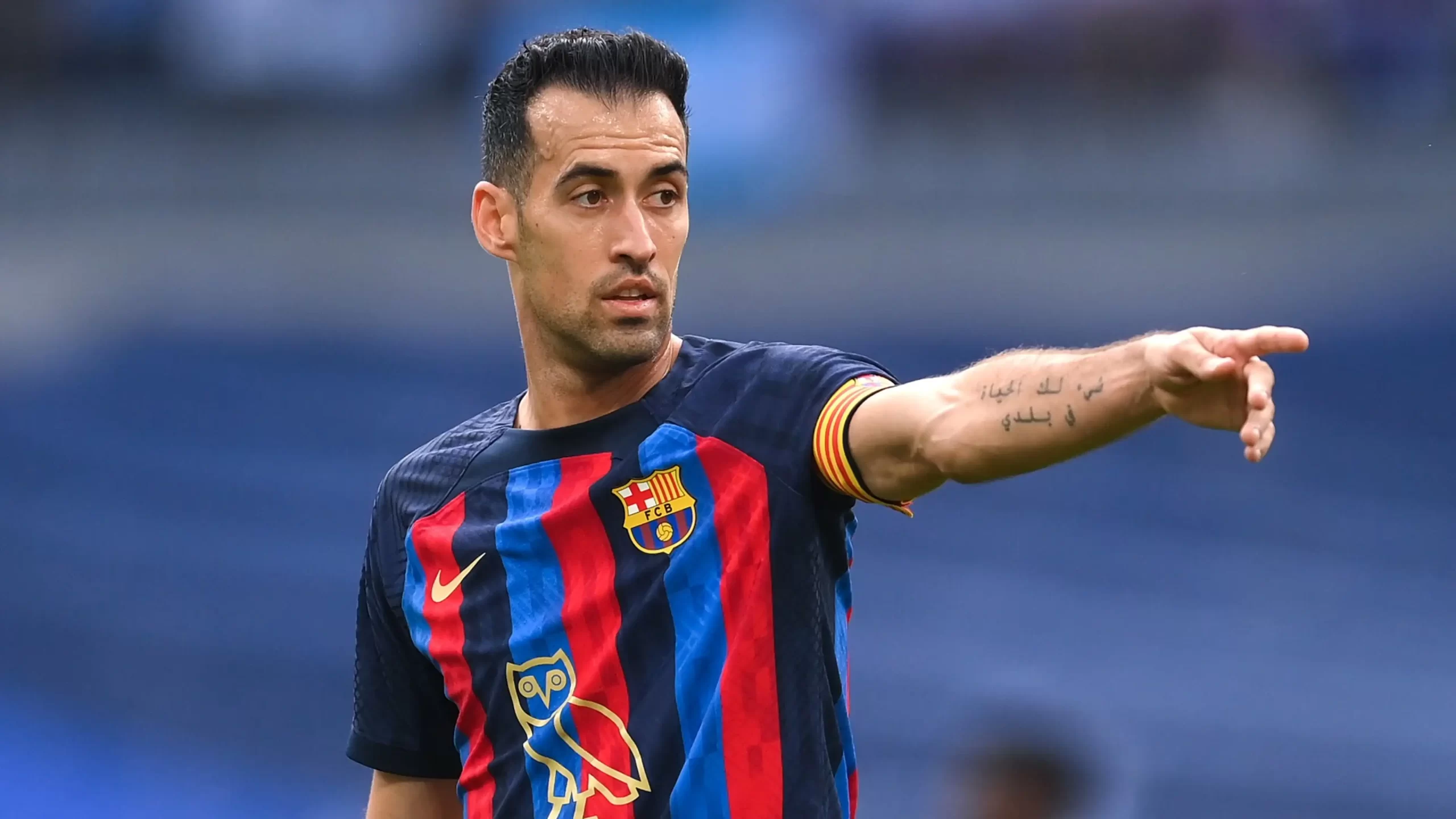 How many trophies has Sergio Busquets won in his career? How many